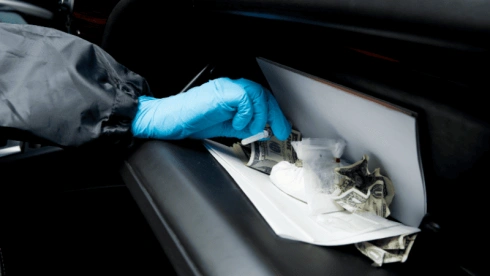 Police and security personnel use rubber gloves